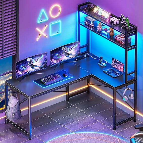 SEDETA L Shaped Gaming Desk, Reversible 45.3 Small Corner Desk with Power Outlet and LED Lights, Corner Gaming Desk with Storage Shelves, Hooks for Small Space, Black